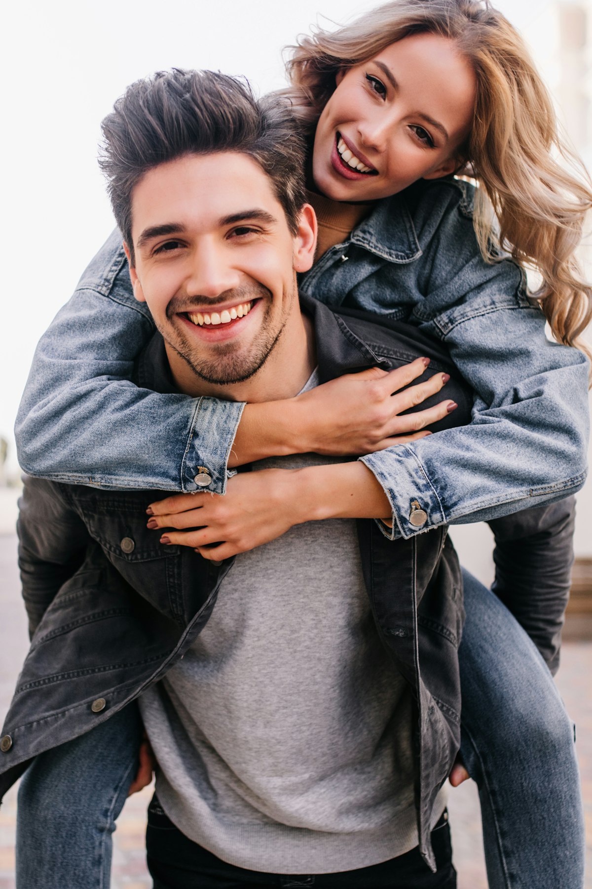 Happy couple smiling together outdoors