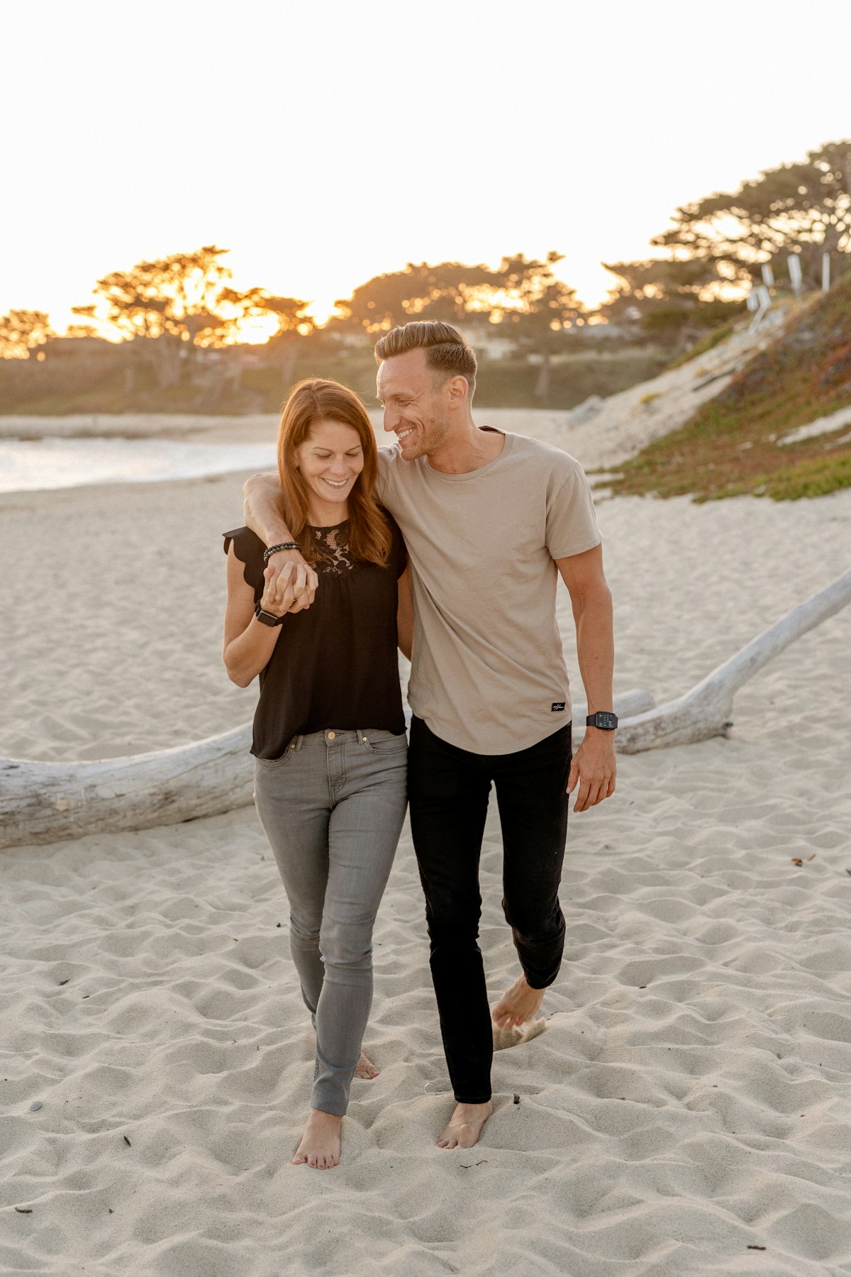 Couple walking together at sunset